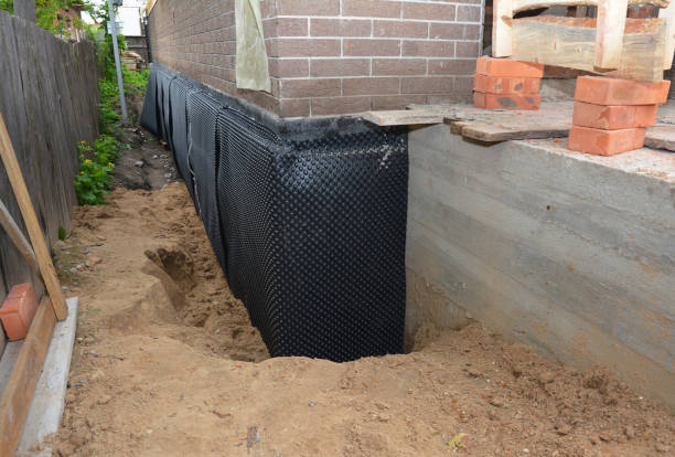 SJ Waterproofing Pros technician performing targeted Exterior Waterproofing assessment in Wauseon, OH